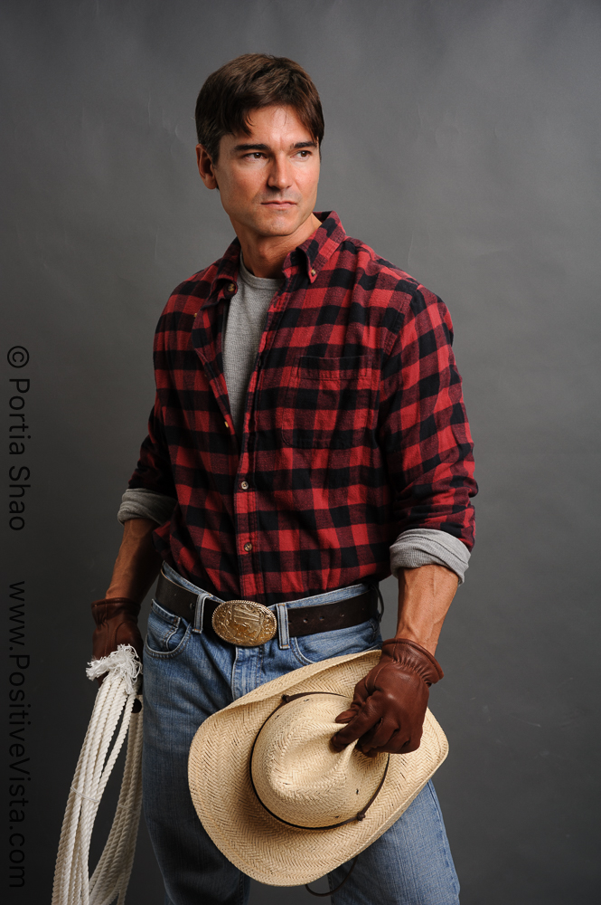 Jason Baca models as a cowboy